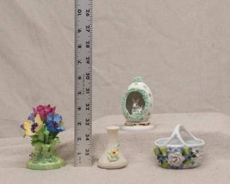 A Staffordshire Fine Bone China floral bouquet figurine, a Belleek Ireland porcelain bud vase, a vintage Irish Dresden Porcelain green lace Easter egg, and a vintage porcelain Easter basket