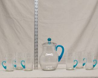 Antique lemonade set with an uranium crackle glass lidded pitcher and 6 glasses with applied blue glass handles