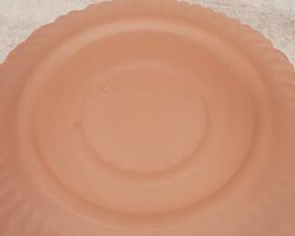 Closeup of charming pair of L.E. Smith elephant finial satin glass powder jars, one pink, one green; vintage depression glass 
