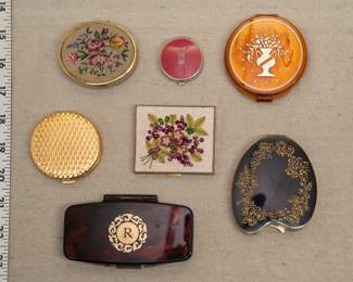Vintage compacts including an Elizabeth Arden Ardena Invisible Veil powder compact, a Charles of the Ritz rouge compact, and an Elizabeth Arden gilded gold "Basket Weave" compact