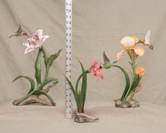 Incredible hand-crafted porcelain works of art: A Boehm "Costa's Hummingbird with Rubrum Lily" porcelain figurine, limited edition #581, dated 1991; a Boehm "Ruby-throated Hummingbird with Moundlily Yucca" porcelain figurine, limited edition #374, dated 1989; and a Boehm "Allen's Hummingbird with Iris" porcelain figurine, limited edition #371, dated 1992.