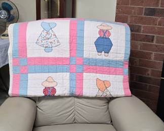 This recliner is in the basement. Under the quilt are the tiny scars from a fateful encounter with a careless feline.