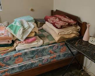 Twin bed, basement bedroom, first on the right