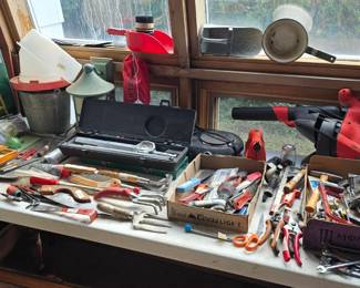 Table of tools and stuff, lower level sunroom.