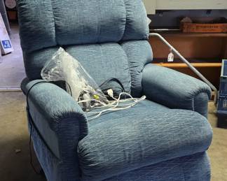 Lift chair from a different estate, in the garage. We didn't have a space free in the house, so in the garage it stays.