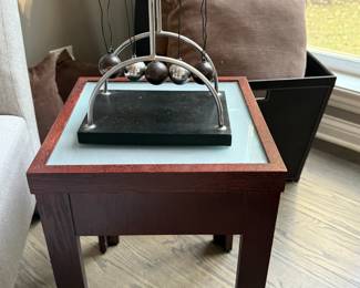 The side table with pendulum game