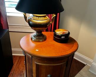 #18 Round Drum Table w/1 door w/Brass Lion Handles 27 Round x 25 Tall $125.00
#19 Metal/Brass Base w/Black Shade Lamp - 30" Tall $75.00