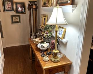 Sofa table, lamps, art work