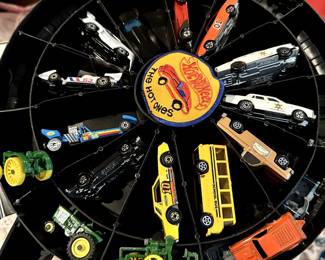 Hot Wheels carrying case and Hot Wheels, also some Tootsie toys