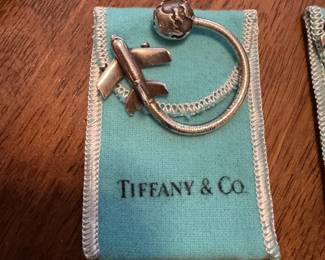 #44 - $100 each -Tiffany sterling key ring airplane & globe horseshoe (2 available)