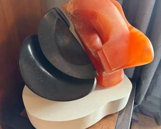 #14 - $2,200 - Sid Kamerman (Born in NY 1943-2016) sculpture "Bears of Bern" Switzerland 15x16 12x10 Bears, the centuries long symbol of Bern, Switzerland, is a rotating sculpture of tranluscent orange alabaster and black. It abstractly depicts the necessity of playful behavior for the bears, physical, metal, social skills. 