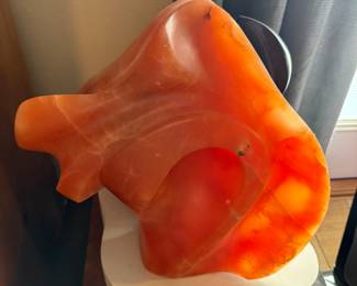 #14 - $2,200 - Sid Kamerman ( Born in NY 1943-2016) sculpture "Bears of Bern" Switzerland 15x16 12x10 Bears, the centuries long symbol of Bern, Switzerland, is a rotating sculpture of tranluscent orange alabaster and black. It abstractly depicts the necessity of playful behavior for the bears, physical, metal, social skills. 