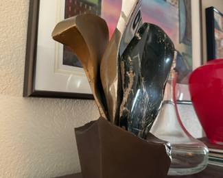 #15 - $1,200 - Sid Kamerman (Born in NY 1943-2016)"Sacred & Secular" 12x9 Highly polished Wyoming jade, polished stainless steel, and bronze characterize this unique sculpture symoblizing ancient values and power to modern function and durability. 