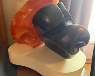 #14 - $2,200 - Sid Kamerman (Born in NY 1943-2016) sculpture "Bears of Bern" Switzerland 15x16 12x10 Bears, the centuries long symbol of Bern, Switzerland, is a rotating sculpture of tranluscent orange alabaster and black. It abstractly depicts the necessity of playful behavior for the bears, physical, metal, social skills. 