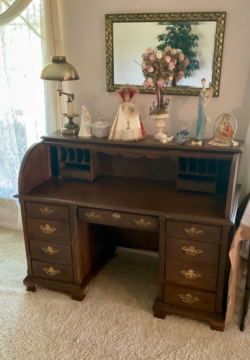 Roll top desk, religious figures, lamp, mirror, figures