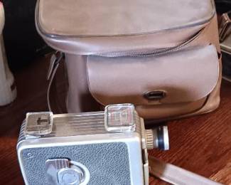 Old school wind up video camera and bag