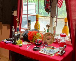 Trunk, shoes, special Olympics awards and memorabilia 