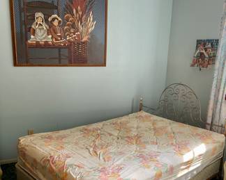 Paintings of dolls on a chair