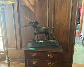 Bronze bird dog, Thomasville cabinet 