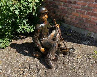 Bronze wagon boy 