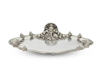 224
A Piero Figura pewter seafood tray for Atena
Late 20th century
Impressed to underside: Figura Piero / Per Atena / [sun cipher] / ETAIN 95%
The seafood/caviar tray mounted with a mermaid figure depicted reclined on a pile of seashells and coral, raised on scallop shell-form feet
4.625" H x 21.5" W x 15.5" D
Estimate: $300 - $500