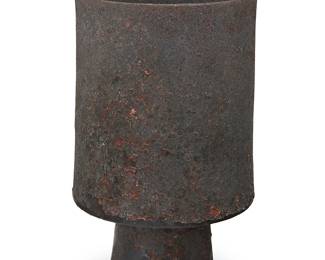 115
Otto Natzler (1908-2007)
A glazed earthenware cylindrical vase form, 1990
Signed and dated to underside: Otto Natzler; with impressed artist's cipher and inscribed: VIII; archive number: X575
The Copper Crater reduction fired glaze with iridescence
8.5" H x 5.5" Dia.
Estimate: $1,000 - $2,000