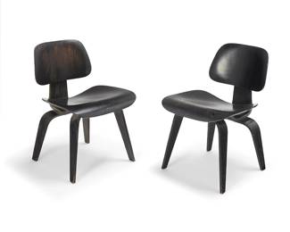 162
Charles and Ray Eames (1907-1978 and 1912-1988)
A pair of ebonized DCW molded plywood side chairs for Herman Miller, 2nd generation (1951-1957)
Designed 1946
One with foil label to underside: Charles Eames design / Herman Miller-zeeland-michigan; the other with sticker ghost and each incised: DCW
Each with molded veneered plywood body with rubber shock mounts, set on two U-form legs with aluminum glides/feet, the underside screws in 5-2-4 formation
2 pieces
Each: 28.75" H x 19.5" W x 21.25" D
Estimate: $700 - $900