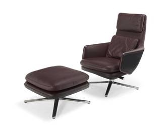 197
Antonio Citterio (b. 1950)
A 'Grand Relax' lounge chair and ottoman for Vitra, 2019
Each with Vitra label to base underside
The leather reclining swivel chair set on a polished cast aluminum four-legged base, with conforming ottoman
2 pieces
Chair: 39.5" H x 27.25" W x 33" D; Ottoman: 15" H x 24" W x 24" D
Estimate: $1,500 - $2,000