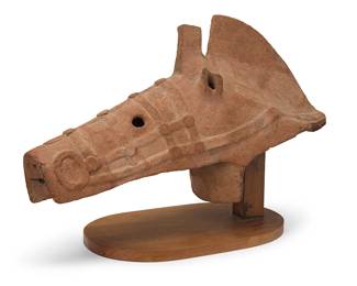 324
A Japanese terracotta Haniwa horse head
Kofun Period (300-538 CE) or later
Set on a custom wood base
Head: 14.5" H x 24" W x 8.75" D; Overall: 15.75" H
Estimate: $1,000 - $2,000