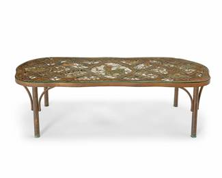 100
Philip and Kelvin LaVerne (1907-1987 and b. 1937)
A 'Fragonard Pierced' coffee table from the 'Historical Civilizations Series,' circa 1960s
Etched signature to top: Kelvin Philip LaVerne
The patinated and pierced bronze table, decorated with gold and copper leaf accents over floral filigree and cloisonné enamel figures below a glass top
17.5" H x 60" W x 24" D
Estimate: $5,000 - $7,000