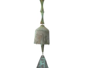238
Paolo Soleri (1919-2013)
A Cosanti wind bell, mid/late 20th century; Paradise Valley, AZ
With cast Paolo Soleri cipher
The cast bronze bell with clapper and sheet copper fin
Overall: 21.5" H; Bell: 6.25" H x 4" Dia.; Fin: 5.5" H x 5.25" W
Estimate: $400 - $600