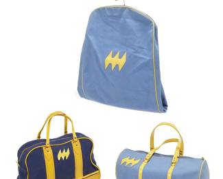 362
A group of Mario Armond Zamparelli and Company for Hughes Airwest prototype luggage
Circa 1970s
Three works designed in Hughes Airwest "Universe Blue" and "Sundance Yellow" corporate color scheme, with pale Universe Blue or navy blue canvas with yellow trim and "triple fuselage" logos, including a navy blue flight bag with mock-up adhesive logos (12" H x 18" W x 8" D), a small Universe Blue duffle bag (8.5" Dia. x 20.5" W), and a Universe Blue zip-up foldable garment bag (47" H x 18.5" W x 3.5" D; closed: 23.5" H)
3 pieces
Estimate: $200 - $400