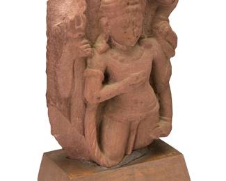 325
An Indian carved stone figural stele
19th century or earlier
Likely depicting Shiva hoisting a trident in one hand and a serpent, possibly Vasuki, in the other, set into a wood base
Stone: 11" H x 8" W x 3.75" D; Overall: 12.5" H x 8.25" W x 4.75" D
Estimate: $800 - $1,200