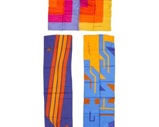 356
A group of Mario Armond Zamparelli and Company for Hughes Airwest hostess scarves
Circa 1970s
Each signed and two dated to weave; two with label: Echo / Made in Japan
Three works with various geometric designs comprising a multicolored square silk scarf (26.5" x 26.5"), a long narrow polyester scarf in blues, tan, and yellow (51.5" x 13"), and a long narrow polyester scarf with a blue, yellow, and orange multistripe design (48" x 12")
3 pieces
Estimate: $100 - $200