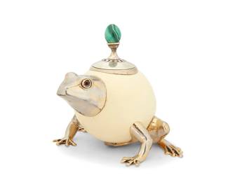 220
Anthony Redmile (1940-2016)
An ostrich egg frog-form trinket box, circa 1980s
Unmarked
The egg mounted with gilt metal legs, head, and a fitted interior with gold wash, the lid with a malachite finial
7.75" H x 7.625" W x 8.625" D
Estimate: $600 - $800