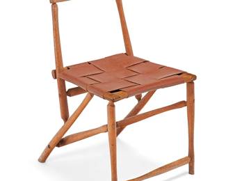 124
Wharton Esherick (1887-1970)
A 'Hammer Handle' chair, circa 1938-1952
Unmarked
The wood frame with later faux leather seat banding and updated rope cording
32" H x 17.5" W x 19" D
Estimate: $3,000 - $5,000