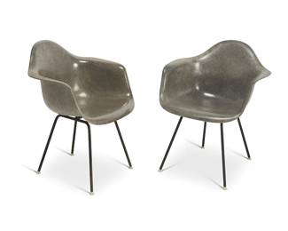 165
Charles and Ray Eames (1907-1978 and 1912-1988)
Two 'Shell Armchairs' for Herman Miller, 4th generation (1959-1993)
Designed 1948
Each unmarked
Each elephant grey fiberglass chair shell raised on two enameled tubular steel U-form legs joined in an H-stretcher with rubber shock mounts and plastic feet
2 pieces
Each: 31.5" H x 24.75" W x 23.75" D
Estimate: $600 - $800