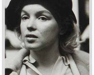 16
Roy Schatt
(1919-2002)
"Marilyn in Rain Hat," 1955
Photographic print on paper
From the edition of unknown size; printed later
Signed in brown ink in the lower margin, at right: Roy Schatt; titled and dated in ink by the artist's wife, Elaine Schatt, on a certificate of authenticity housed in a plastic sleeve affixed to the frame's backing board
Image: 18.75" H x 12" W; Sight: 19.75" H x 13" W
Estimate: $500 - $700