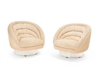 257
Vladimir Kagan (1927-2016)
A pair of swivel chairs, late 20th century
Each with tag applied to underside: Vladimir Kagan Designs Inc.
The barrel-style lounge chairs, each with tan textured boucle fabric upholstery, raised on a swiveling round wood base with polished metal siding, raised on casters
2 pieces
Each: 30.75" H x 35.5" Dia.
Estimate: $2,000 - $4,000