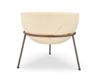 118
John Follis (1923-1994)
An Architectural Pottery bisque earthenware planter, circa 1955
Unmarked
The ceramic bowl set in a metal tripod base
Planter: 8" H x 15.75" Dia.; Stand: 9.5" H x 17" Dia.
Estimate: $700 - $900