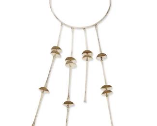 14
A sterling silver modernist-style floral chime necklace
Late 20th century
With star/flower maker's mark to ring hook terminal
A sterling silver wire collar suspending four articulated stylized floriform dangles of various lengths
16.5" inner C x 10" H
248.0 grams gross
Estimate: $300 - $500