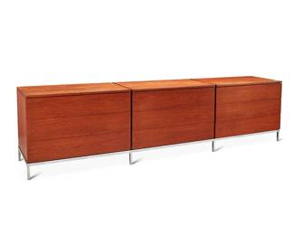 170
Florence Knoll (1917-2019)
A teak triple-chest dresser, mid-20th century
Appears unmarked
Comprising three 3-drawer consoles, each console upper drawer with five partitions, middle drawer with two partitions, and lower drawer open, set on a chromed steel base
Overall: 28.75" H x 109.5" W x 19.5" D; Each console: 23.25" H x 36.75" W
Estimate: $2,500 - $3,500