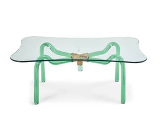 54
A Seguso Vetri d'Arte art glass coffee table
Circa 1950s
Appears unmarked
The tubular glass frame joined by a gold-toned metal X-form bracket, surmounted by a glass top
Frame: 16.75" H x 30.5" W x 19" D; Glass: 0.5" H x 44.25" W x 28" D
Estimate: $1,000 - $2,000