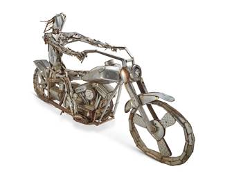 208
Stanton Segner
(1966-1997)
Ghostrider motorcycle sculpture, 1991
Welded nickel, motorcycle chain, headlight, and mixed metal media, electrified
Signed and dated in solder to one side: S Segner 10-1-91
78" H x 150" W x 36" D
Estimate: $2,000 - $4,000