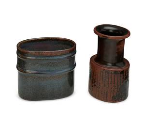 203
Stig Lindberg (1916-1982)
Two studio pottery vases, mid-20th century
Each incised with artists cipher and signed: Stig L
Comprising an ovular cylinder form with two ribs and blue glaze, and a brown-glazed form with flared rim
2 pieces
Taller: 7" H x 4.375" W x 3.625" D; Shorter: 5.5" H x 6.125" W x 4" D
Estimate: $400 - $600