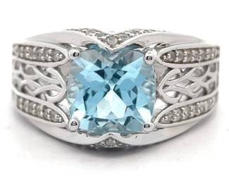 2.89 Carat Oval Blue & Pavé White Topaz Filigree Ring