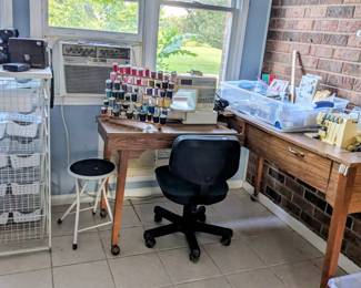 Sewing table with sewing machine, embroidery and surger, organization display 