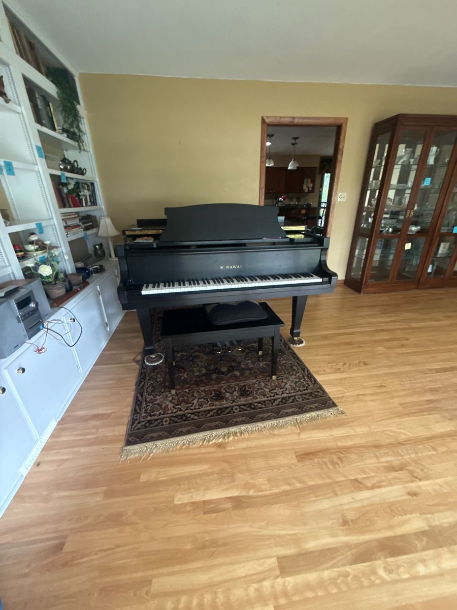 Baby Grand Piano K.  Kawai 
Sounds Lovely!!  
Arrange help to move Piano 