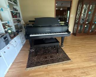 Baby Grand Piano K.  Kawai 
Sounds Lovely!!  
Arrange help to move Piano 