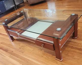 Beautiful wooden coffee table with drawers and glass top